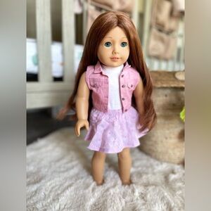 SOLD.                    American girl doll Saige Copeland.